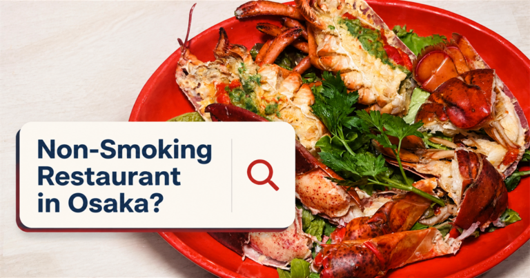 赤い皿に盛り付けられた活オマール海老の写真と「Non-Smoking Restaurant in Osaka?」の文字